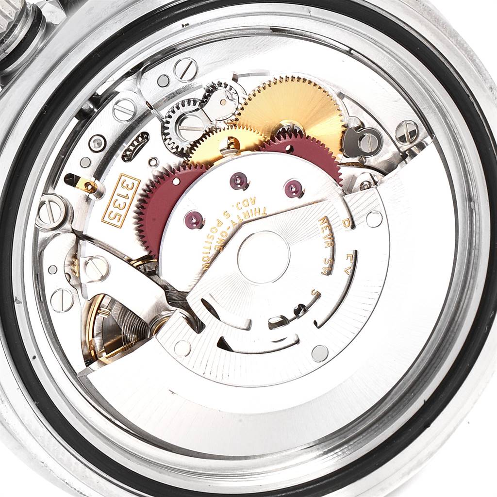This is a close-up view of the internal movement mechanism of a Rolex Submariner 16610LV Men's Stainless Steel Black Dial 16610LV Men's Stainless Steel Black Dial watch.