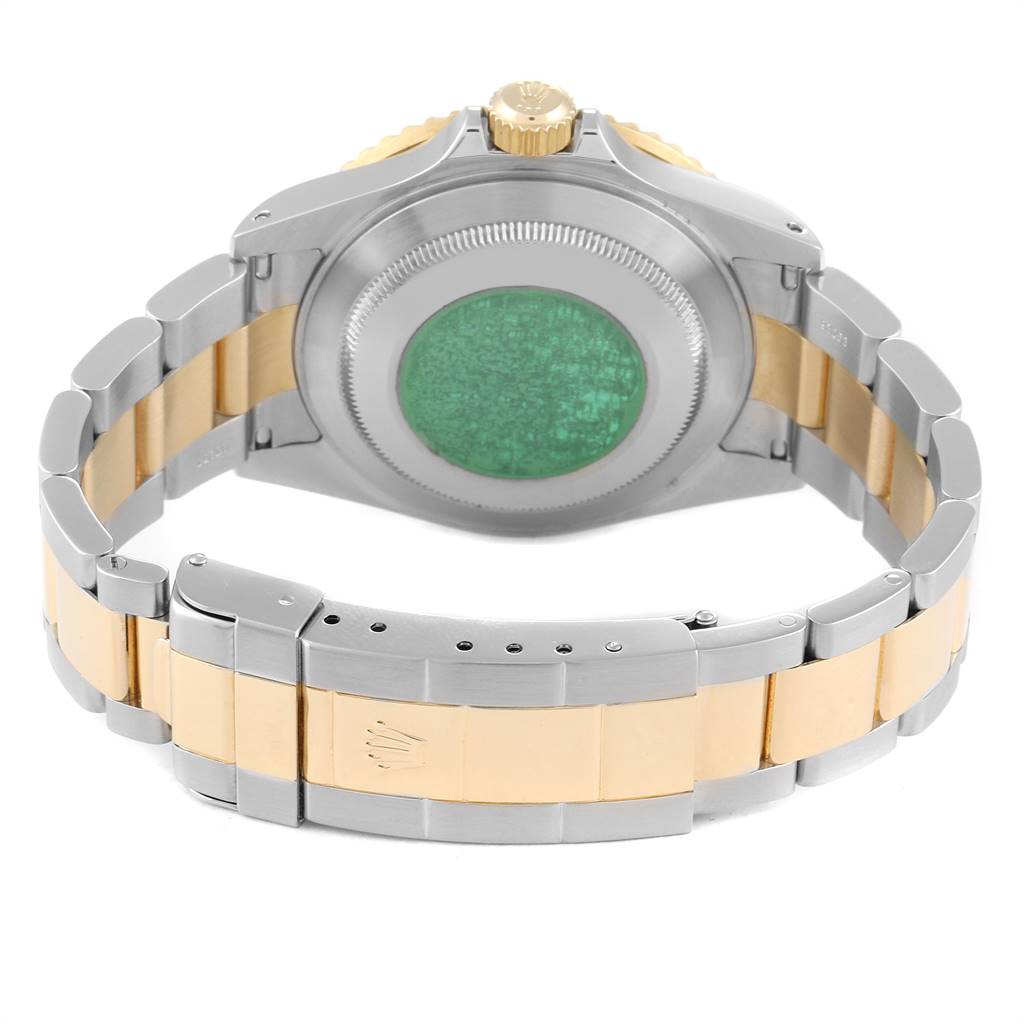 The image shows the back case and bracelet of a Rolex Submariner 16613 Men
s Steel and Gold (two tone) Blue Dial 16613 Men
s Steel and Gold (two tone) Blue Dial watch, viewed from the rear angle.