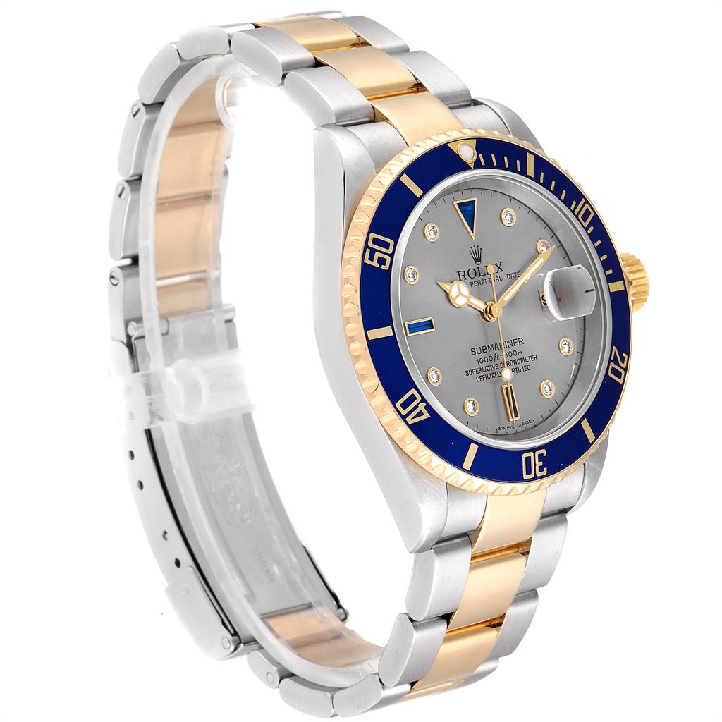 This image shows a Rolex Submariner 16613 Men
s Steel and Gold (two tone) Grey Dial 16613 Men
s Steel and Gold (two tone) Grey Dial watch at a three-quarter angle highlighting the dial, bezel, and bracelet.