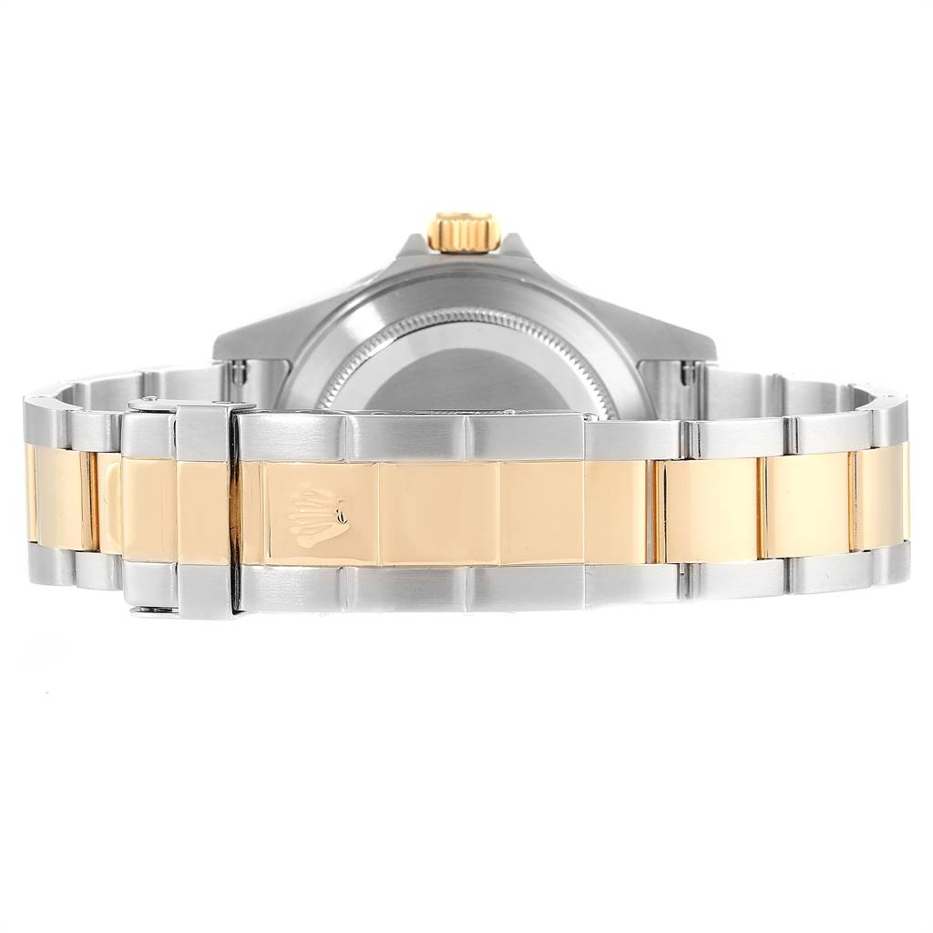 The image shows the back view of the Rolex Submariner 16613 Men
s Steel and Gold (two tone) Grey Dial 16613 Men
s Steel and Gold (two tone) Grey Dial, highlighting its two-tone bracelet and clasp.