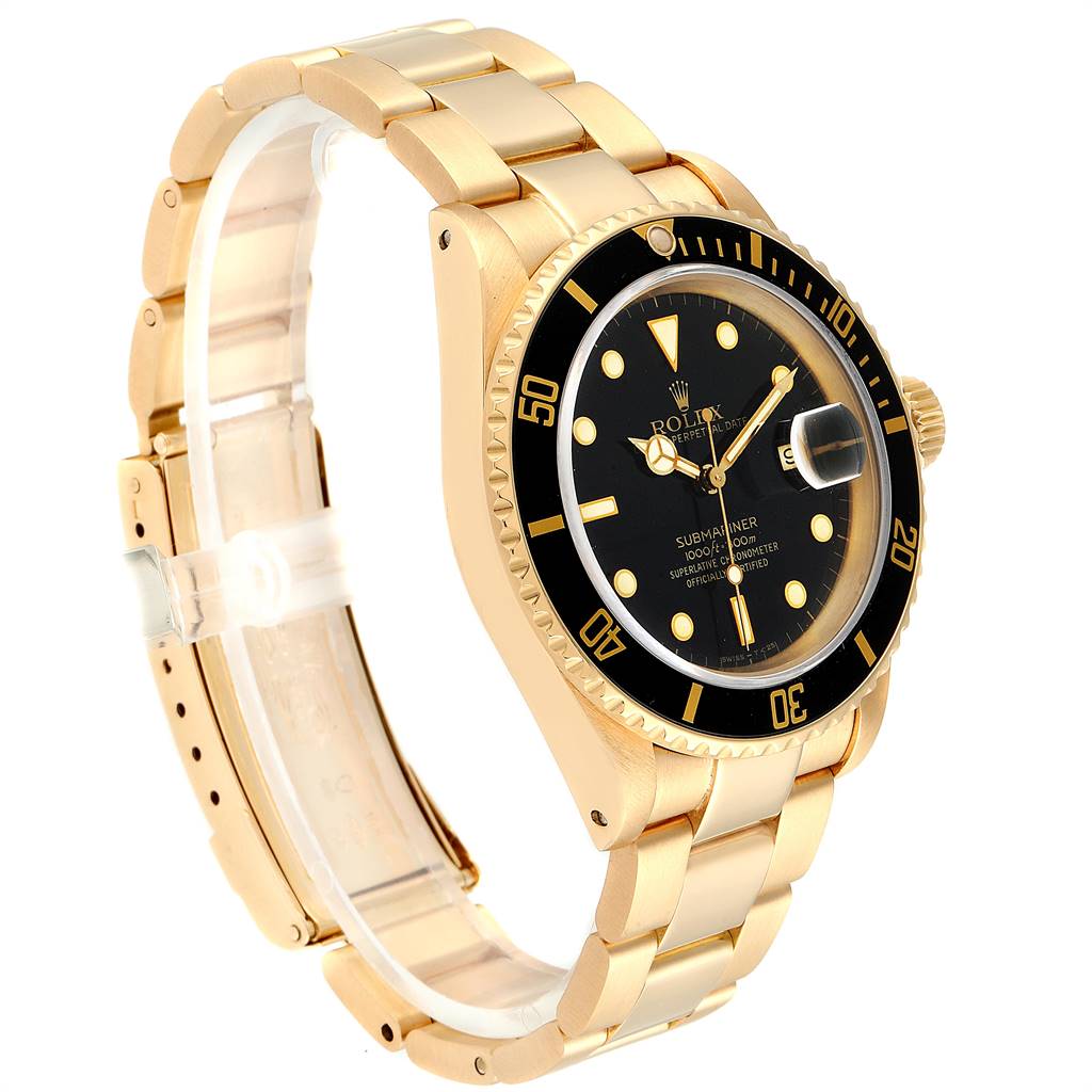 The image shows a side view of a gold Rolex Submariner 16618 Men
s Yellow Gold Black Dial 16618 Men
s Yellow Gold Black Dial watch, highlighting its bracelet, bezel, crown, and dial.