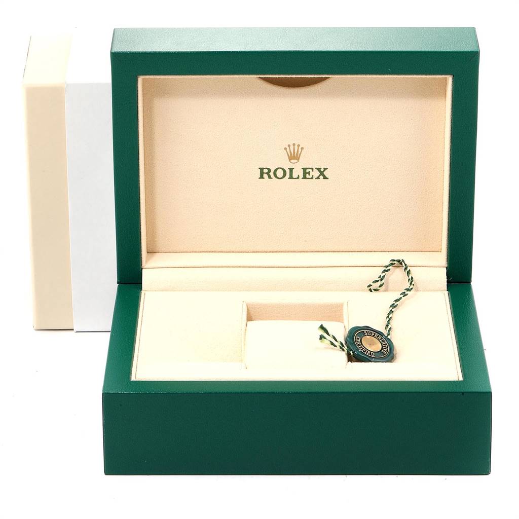 The image shows an open green and beige watch box for a Rolex Submariner 16613 Men
s Steel and Gold (two tone) Blue Dial 16613 Men
s Steel and Gold (two tone) Blue Dial, featuring the Rolex logo and a green tag inside.