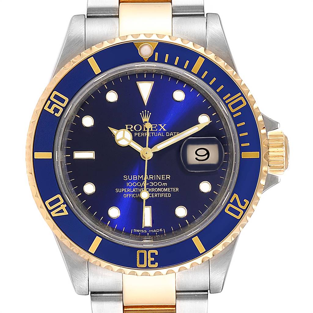 The Rolex Submariner 16613 Men
s Steel and Gold (two tone) Blue Dial 16613 Men
s Steel and Gold (two tone) Blue Dial watch is shown from a front angle, showcasing the dial, bezel, crown, and part of the bracelet.