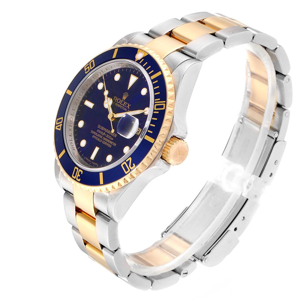 This image shows a Rolex Submariner 16613 Men
s Steel and Gold (two tone) Blue Dial 16613 Men
s Steel and Gold (two tone) Blue Dial watch at a three-quarter angle, highlighting its blue bezel, dial, and two-tone bracelet.