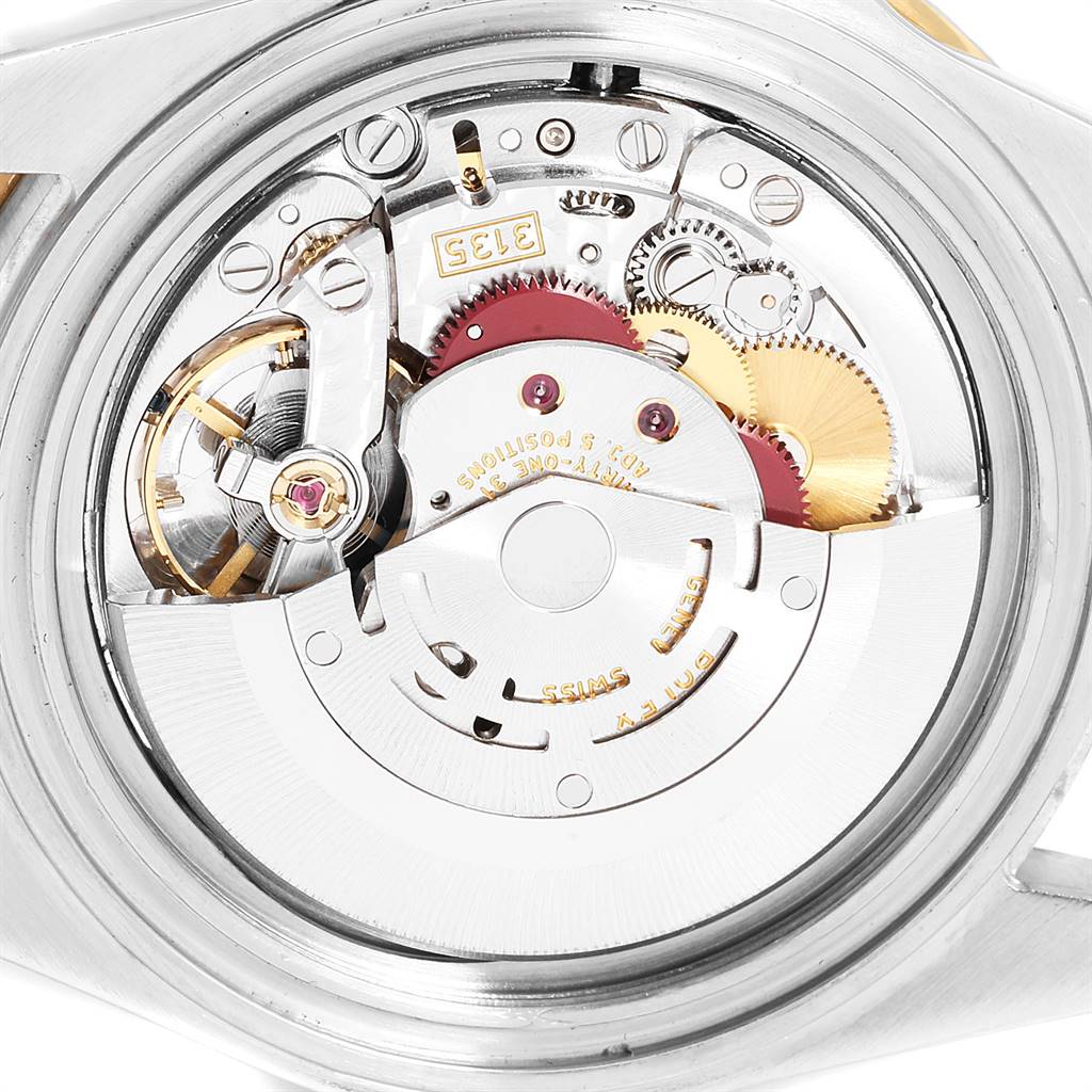 This image shows the internal mechanical movement of the Rolex Submariner 16613 Men's Steel and Gold (two tone) Black Dial 16613 Men's Steel and Gold (two tone) Black Dial watch from a top-down angle.