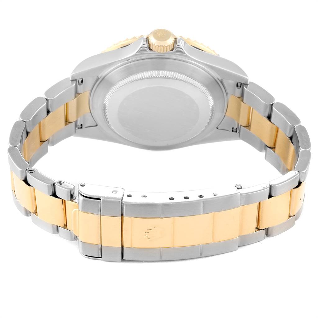 This image shows the back case and bracelet of a Rolex Submariner 16613 Men's Steel and Gold (two tone) Black Dial 16613 Men's Steel and Gold (two tone) Black Dial watch viewed from the rear angle.