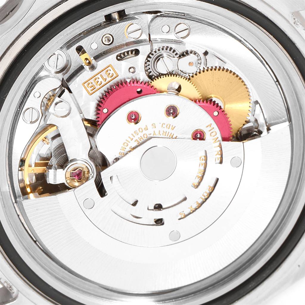 The image shows the internal movement and mechanics of the Rolex Submariner 16610 Men
s Stainless Steel Black Dial 16610 Men
s Stainless Steel Black Dial watch from a back view.