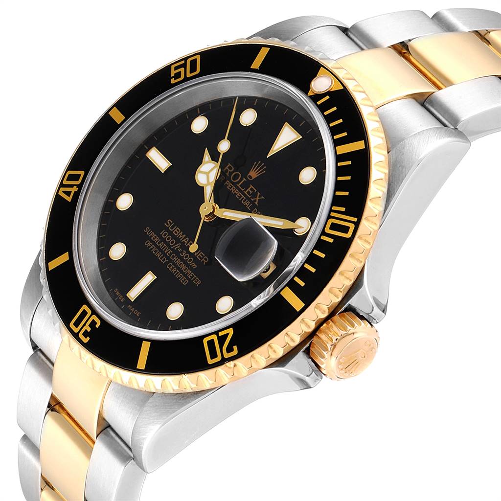 The image shows a side angle of a Rolex Submariner 16613 Men
s Steel and Gold (two tone) Black Dial 16613 Men
s Steel and Gold (two tone) Black Dial watch, highlighting the bezel, dial, and crown.