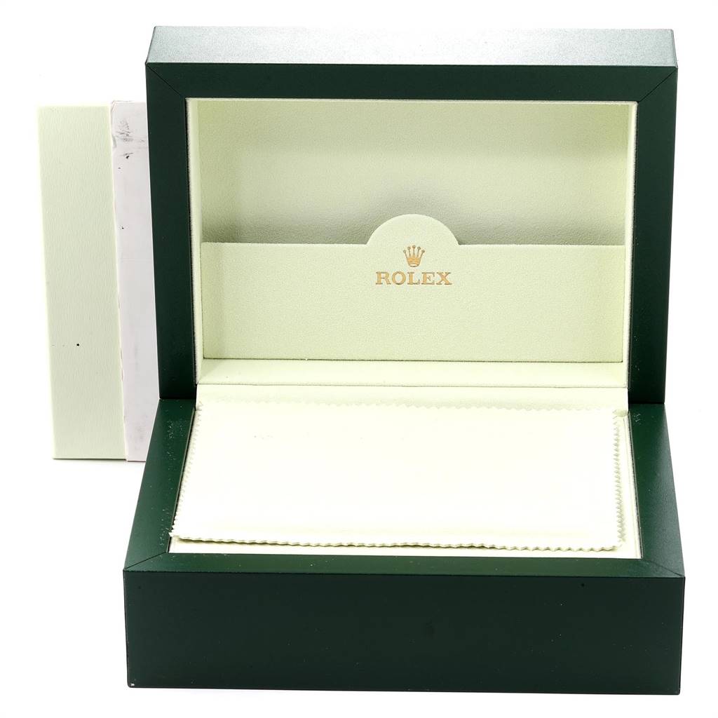 This image shows an open green Rolex Submariner 16613 Men
s Steel and Gold (two tone) Grey Dial 16613 Men
s Steel and Gold (two tone) Grey Dial watch box with the Rolex logo inside.