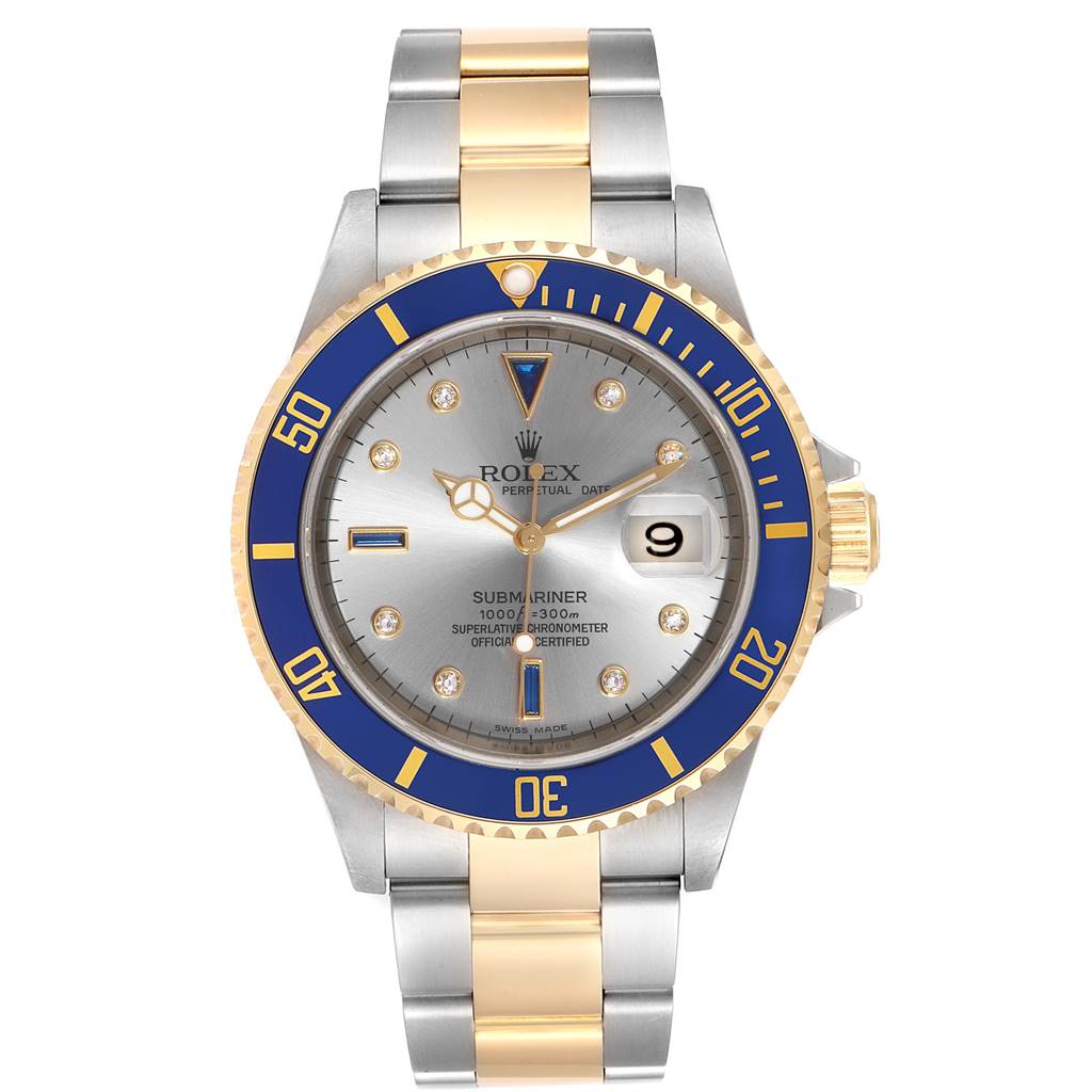 The image shows a front view of the Rolex Submariner 16613 Men
s Steel and Gold (two tone) Grey Dial 16613 Men
s Steel and Gold (two tone) Grey Dial watch, featuring a two-tone metal bracelet, blue bezel, and silver dial.