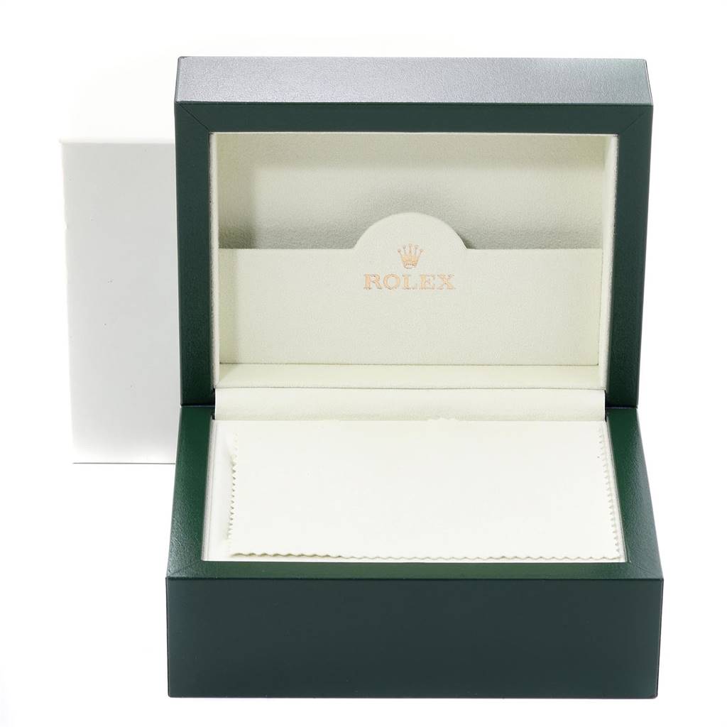 The image shows an empty green and white Rolex Submariner 16613 Men
s Steel and Gold (two tone) Champagne Dial 16613 Men
s Steel and Gold (two tone) Champagne Dial watch box with the brand logo inside.