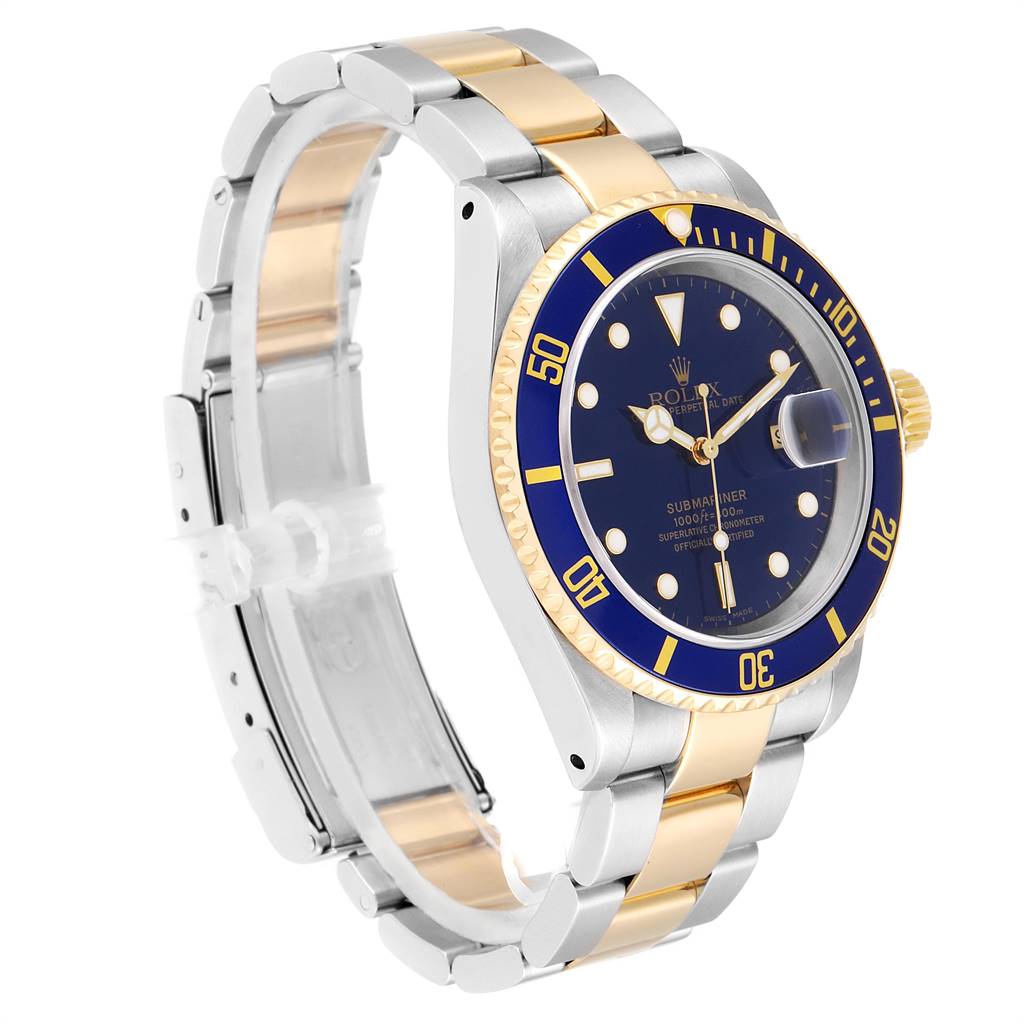 The image shows a side angle of a Rolex Submariner 16613 Men
s Steel and Gold (two tone) Blue Dial 16613 Men
s Steel and Gold (two tone) Blue Dial watch featuring a blue dial, two-tone bracelet, and bezel with gold accents.