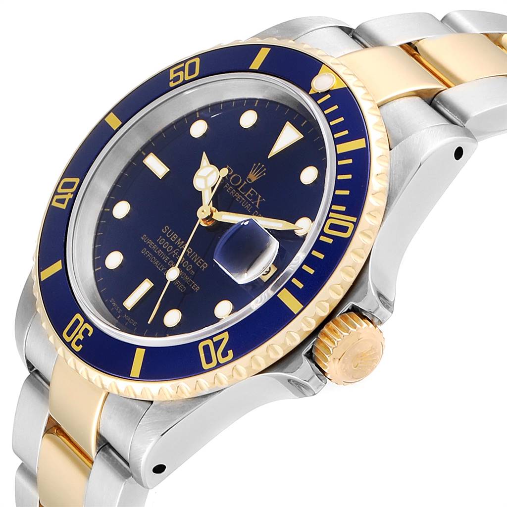 The image shows a close-up side angle of the Rolex Submariner 16613 Men
s Steel and Gold (two tone) Blue Dial 16613 Men
s Steel and Gold (two tone) Blue Dial watch, highlighting the blue bezel, dial, crown, and part of the bracelet.