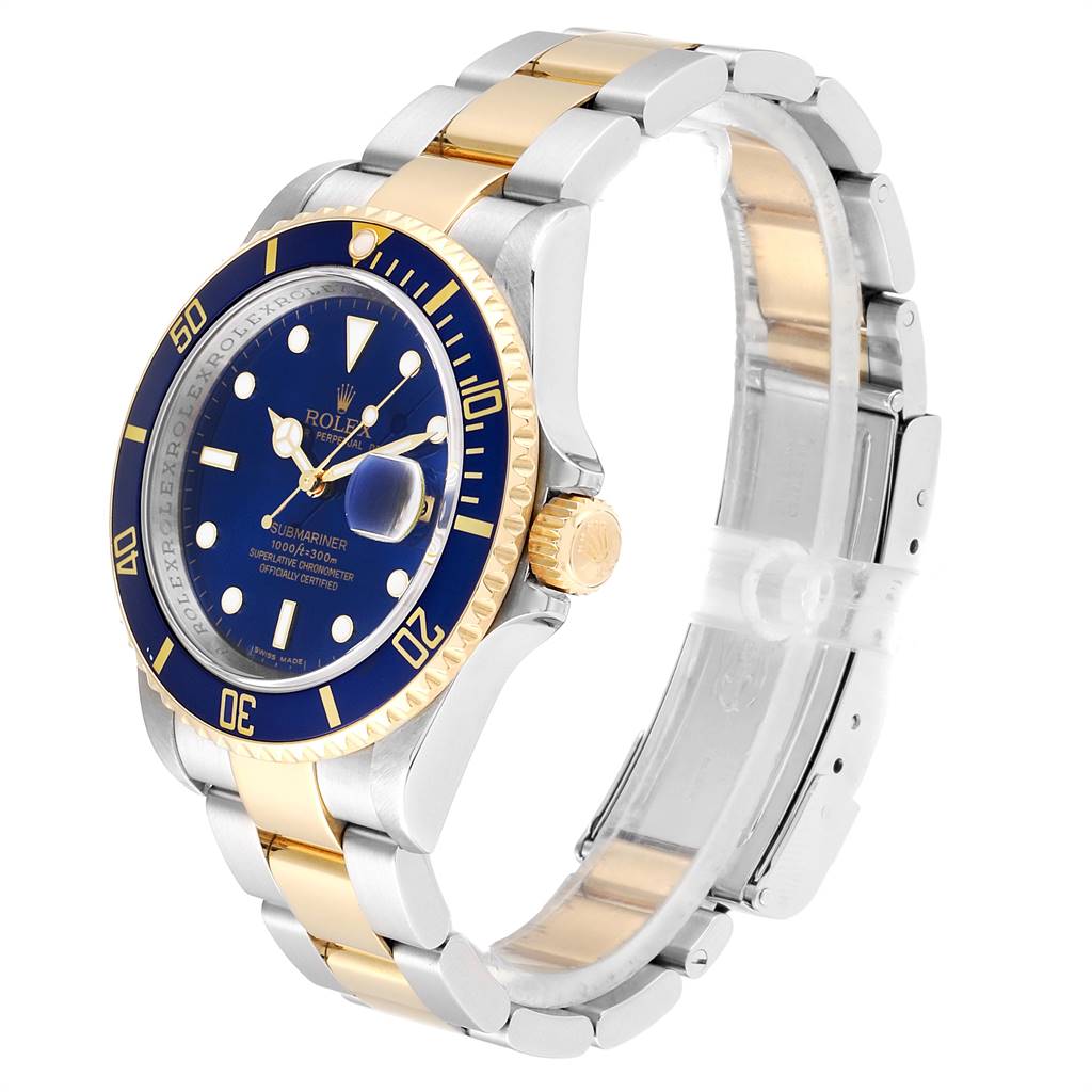 This image shows a Rolex Submariner 16613 Men
s Steel and Gold (two tone) Blue Dial 16613 Men
s Steel and Gold (two tone) Blue Dial watch at a three-quarter angle, displaying its blue dial, gold bezel, and two-tone bracelet.