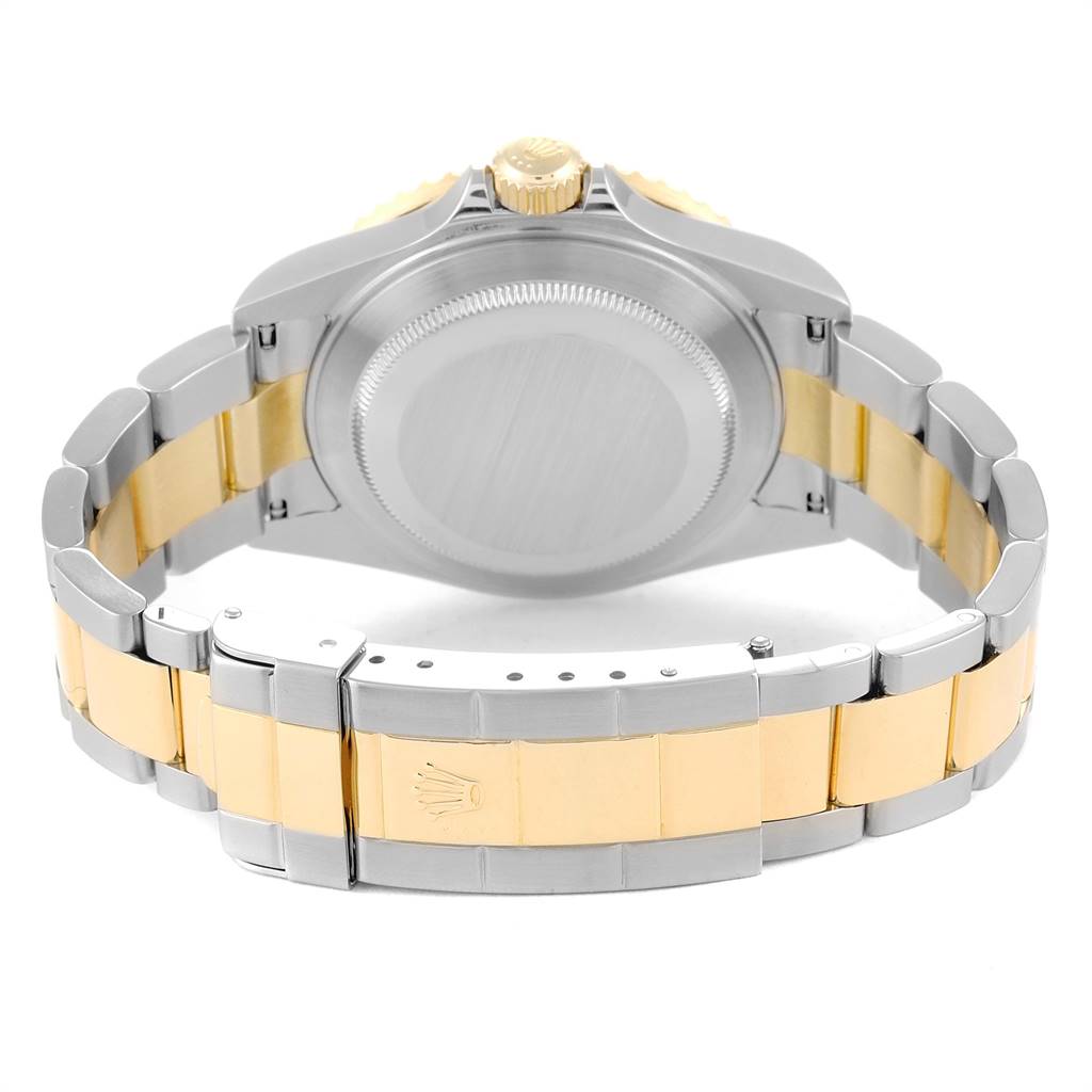 This image shows the back view of a Rolex Submariner 16613 Men
s Steel and Gold (two tone) Blue Dial 16613 Men
s Steel and Gold (two tone) Blue Dial watch, highlighting the case back, crown, and bracelet with clasp in stainless steel and gold.