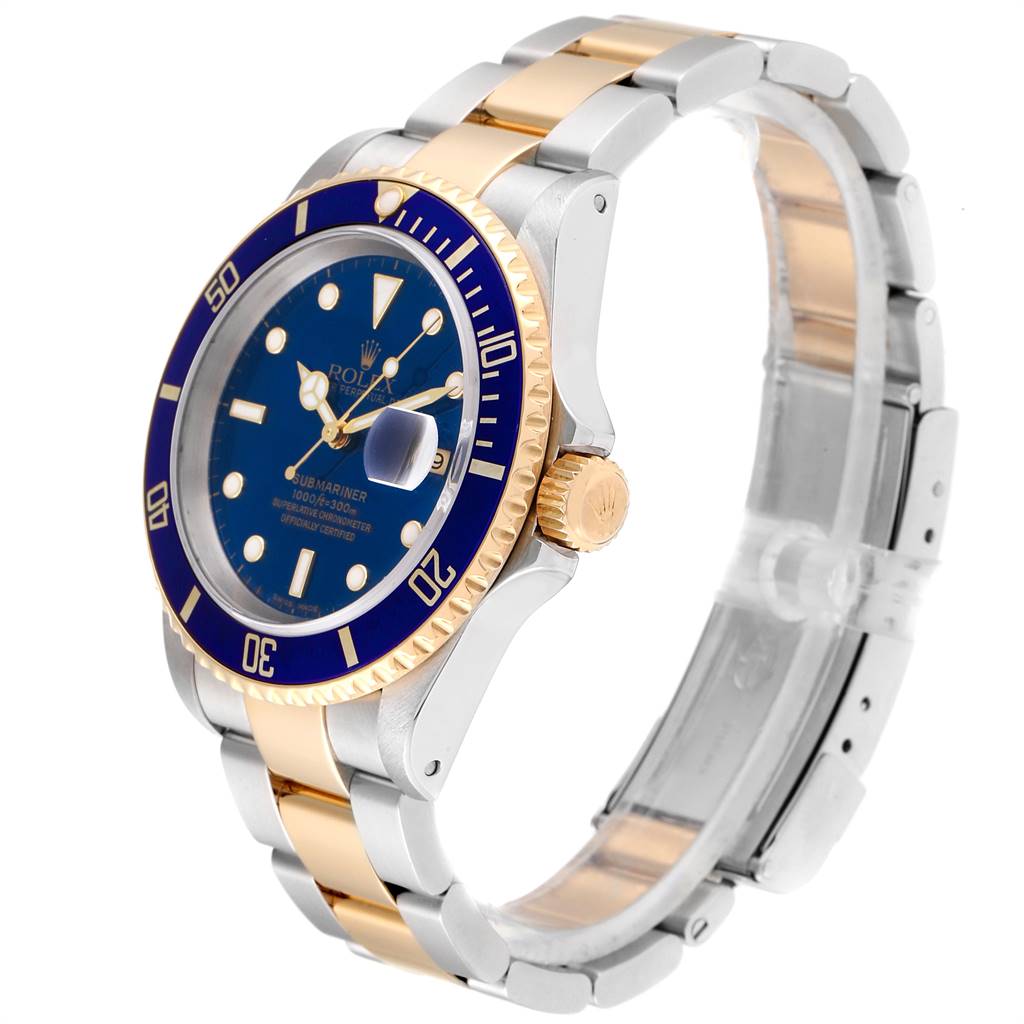 The image shows a side angle view of a Rolex Submariner 16613 Men
s Steel and Gold (two tone) Blue Dial 16613 Men
s Steel and Gold (two tone) Blue Dial watch, highlighting its blue dial, bezel, and two-tone bracelet.