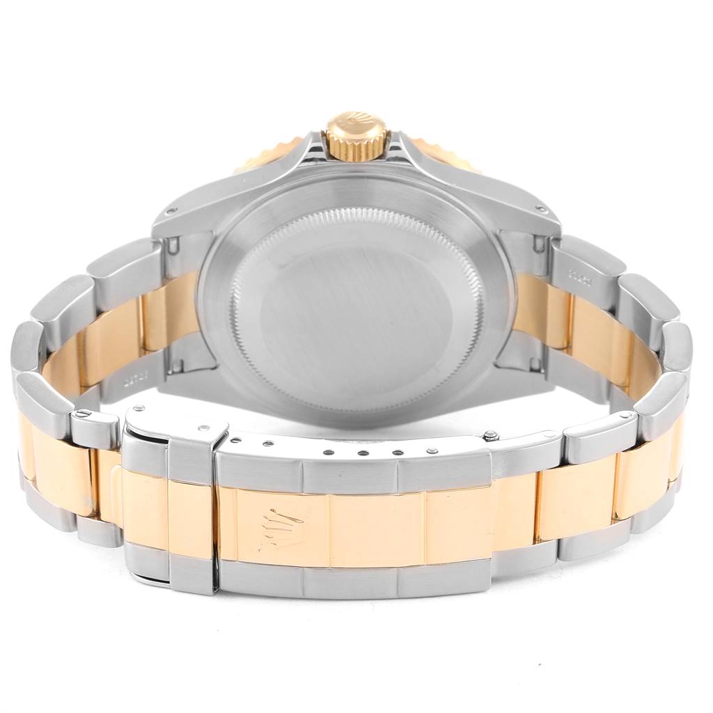 This is a rear view of a Rolex Submariner 16613 Men
s Steel and Gold (two tone) Blue Dial 16613 Men
s Steel and Gold (two tone) Blue Dial watch, showing the case back, crown, and two-tone bracelet.