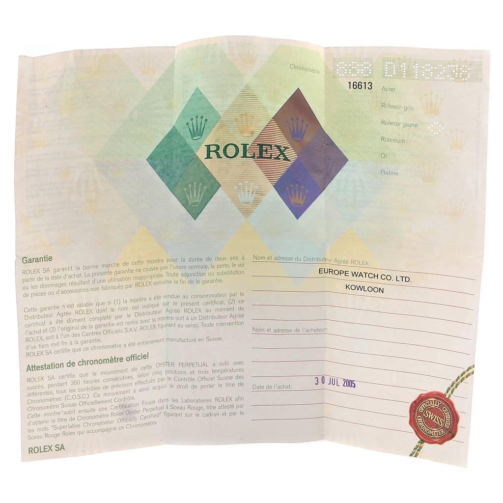 This image shows the warranty card for a Rolex Submariner 16613 Men
s Steel and Gold (two tone) Blue Dial 16613 Men
s Steel and Gold (two tone) Blue Dial, specifically model 16613, from a frontal angle.