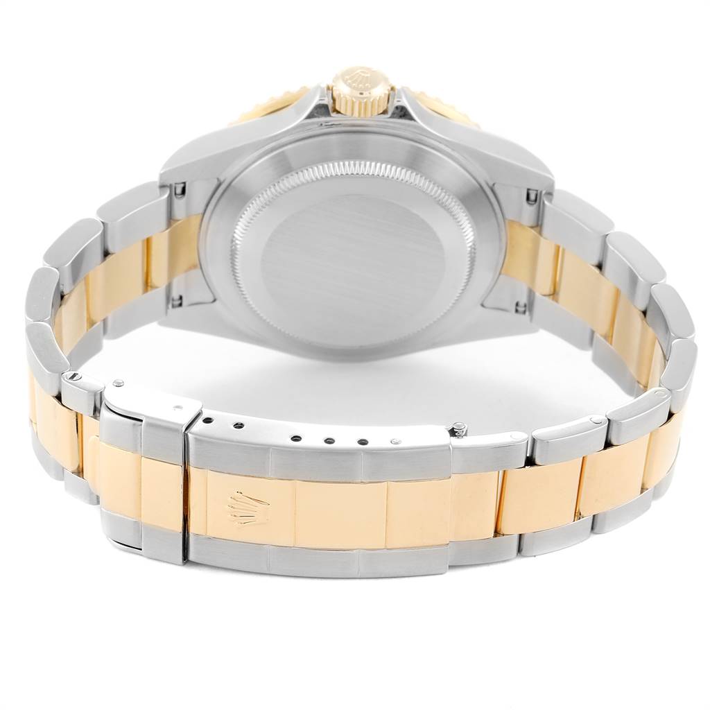 This image shows the rear view of a Rolex Submariner 16613 Men
s Steel and Gold (two tone) Blue Dial 16613 Men
s Steel and Gold (two tone) Blue Dial watch, highlighting its bracelet and case back.