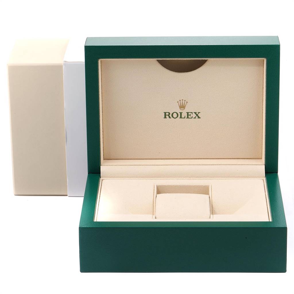 This is an open, green Rolex Submariner 116613 Men's Steel and Gold (two tone) Black Dial 116613 Men's Steel and Gold (two tone) Black Dial watch box, displaying the branded interior compartment for holding the watch.