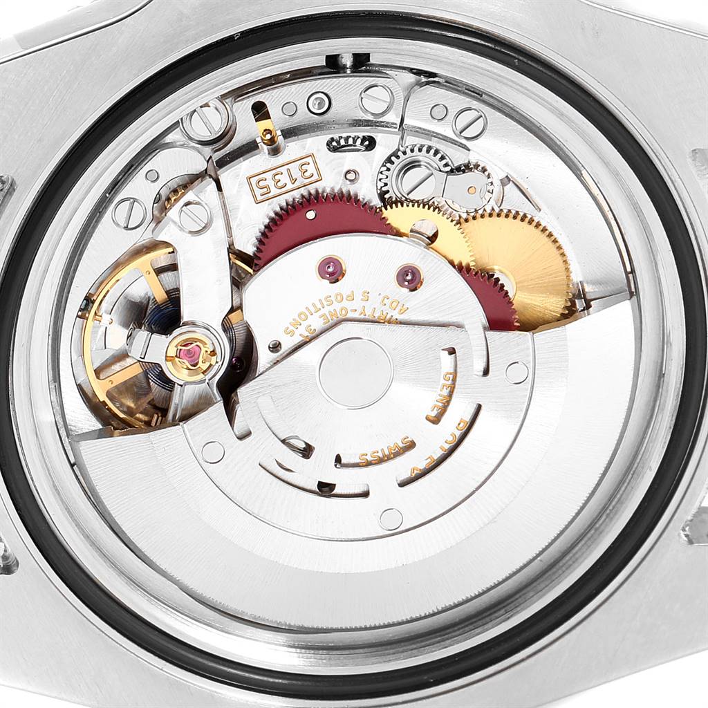 This image shows a close-up view of the movement mechanism inside a Rolex Submariner 116613 Men
s Steel and Gold (two tone) Black Dial 116613 Men
s Steel and Gold (two tone) Black Dial watch.