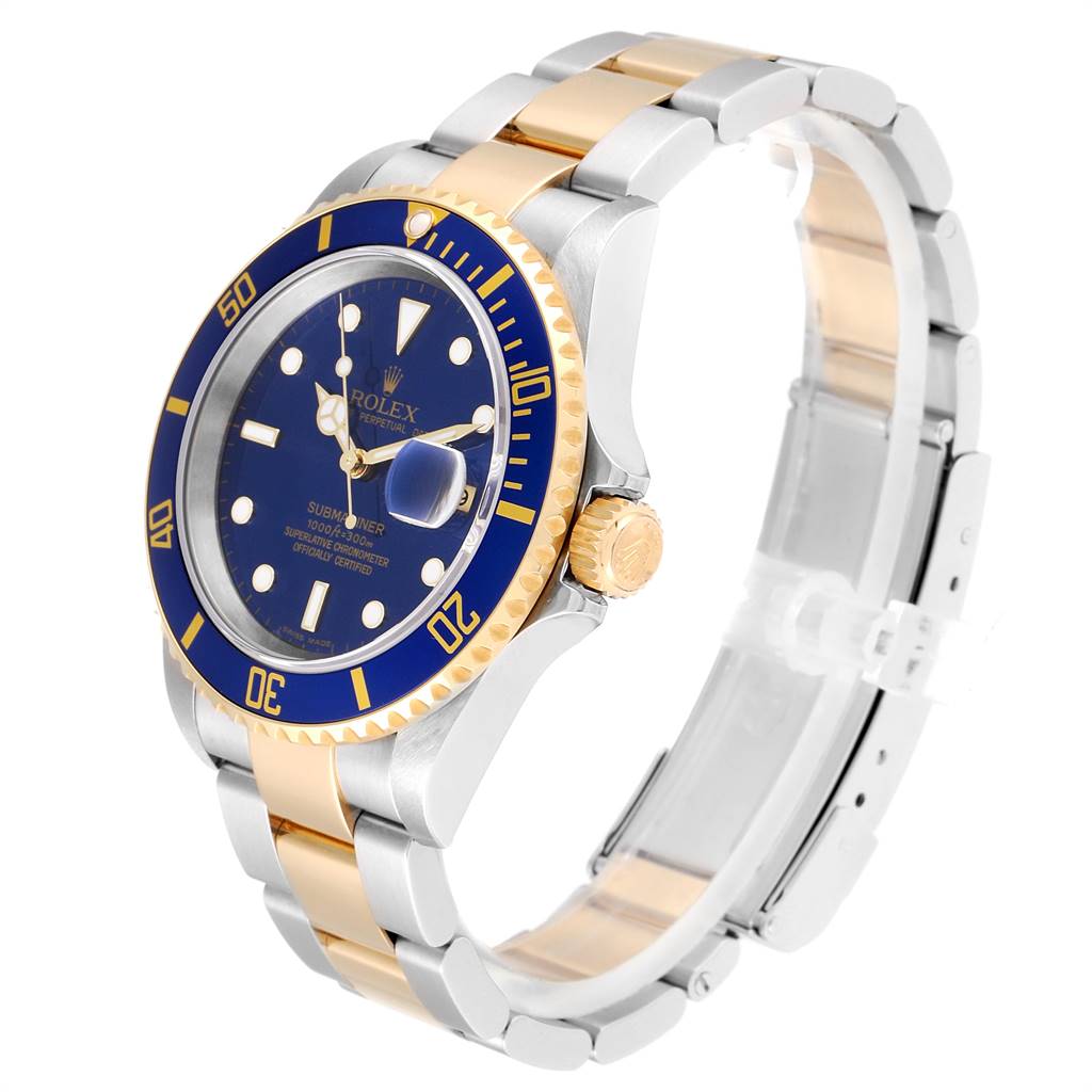 The image shows a Rolex Submariner 16613 Men
s Steel and Gold (two tone) Blue Dial 16613 Men
s Steel and Gold (two tone) Blue Dial watch at a three-quarter angle, highlighting its bezel, face, crown, and bracelet.