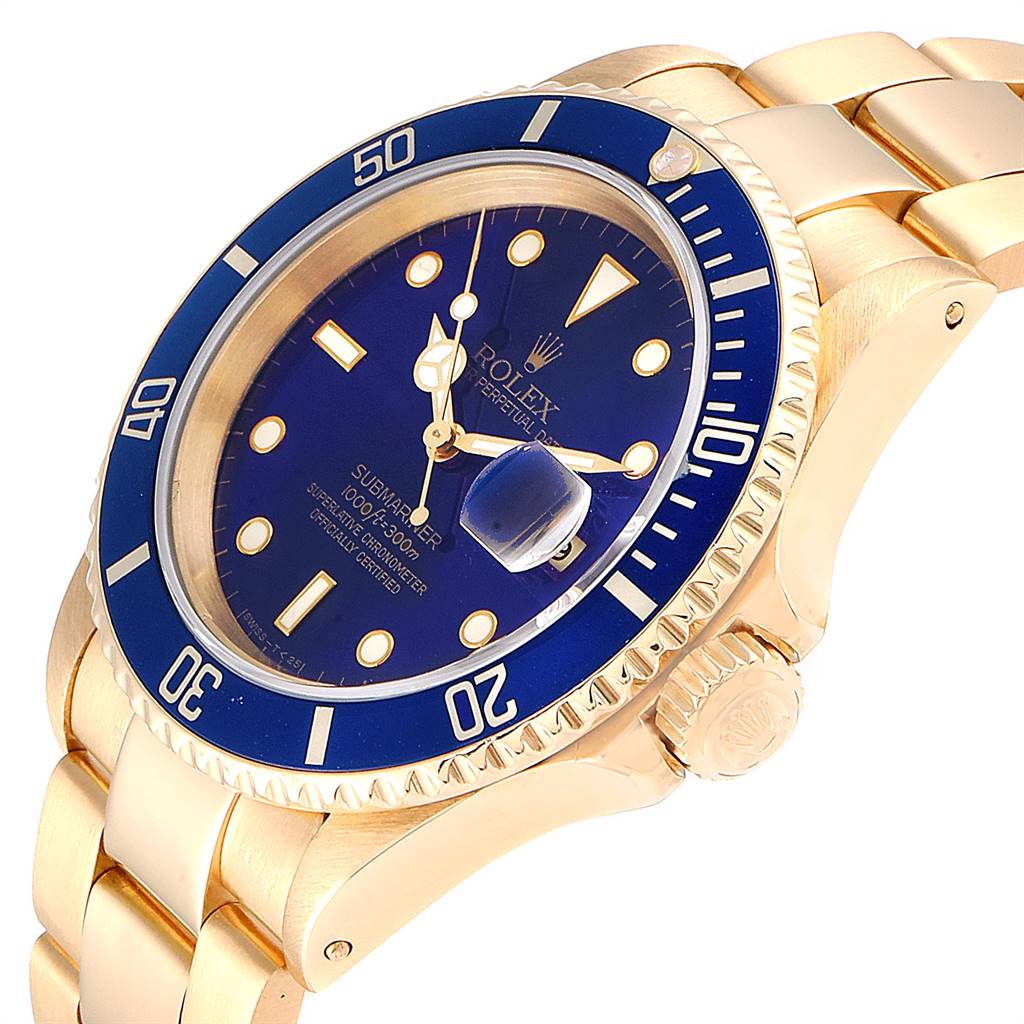 This image shows the Rolex Submariner 16618 Men's Yellow Gold Blue Dial 16618 Men's Yellow Gold Blue Dial watch at a slight angle, highlighting the blue bezel, dial, and gold bracelet.