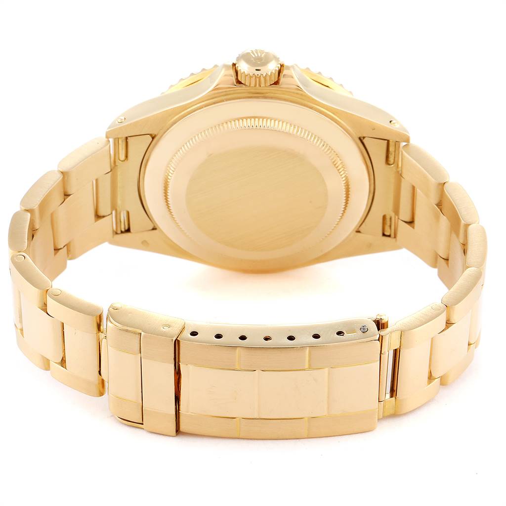 The image shows the backside and bracelet of a Rolex Submariner 16618 Men's Yellow Gold Blue Dial 16618 Men's Yellow Gold Blue Dial watch, highlighting the clasp and case back.