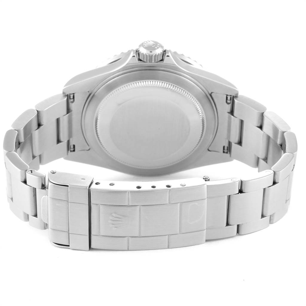 This image shows the back view of a Rolex Submariner 16610LV Men
s Stainless Steel Black Dial 16610LV Men
s Stainless Steel Black Dial watch, highlighting its case back and metal bracelet.