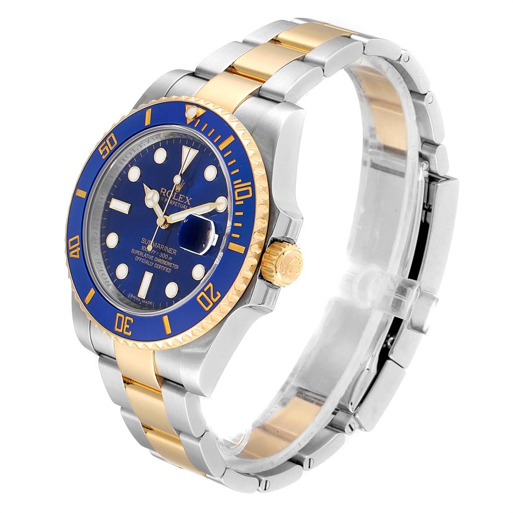 The image shows a Rolex Submariner 116613 Men
s Steel and Gold (two tone) Blue Dial 116613 Men
s Steel and Gold (two tone) Blue Dial watch angled slightly from the right, displaying the blue dial, bezel, and two-tone bracelet.