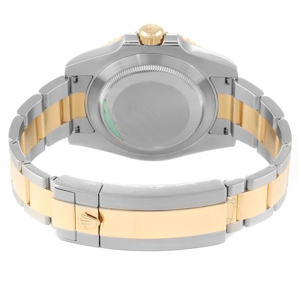 This image shows the back view of the Rolex Submariner 116613 Men
s Steel and Gold (two tone) Blue Dial 116613 Men
s Steel and Gold (two tone) Blue Dial watch, highlighting the case back, bracelet, and clasp.