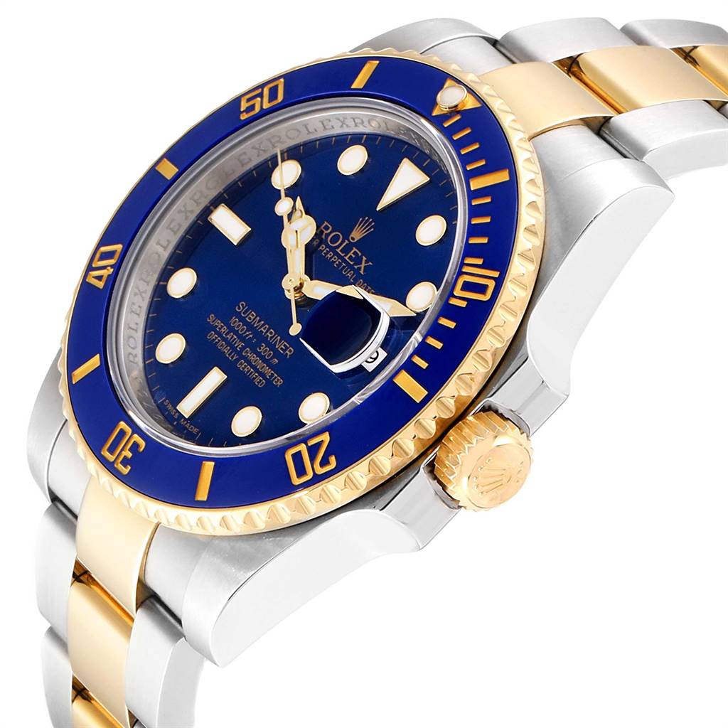 The image shows a Rolex Submariner 116613 Men
s Steel and Gold (two tone) Blue Dial 116613 Men
s Steel and Gold (two tone) Blue Dial watch at an angle, displaying its blue dial, bezel, and gold crown and bracelet links.