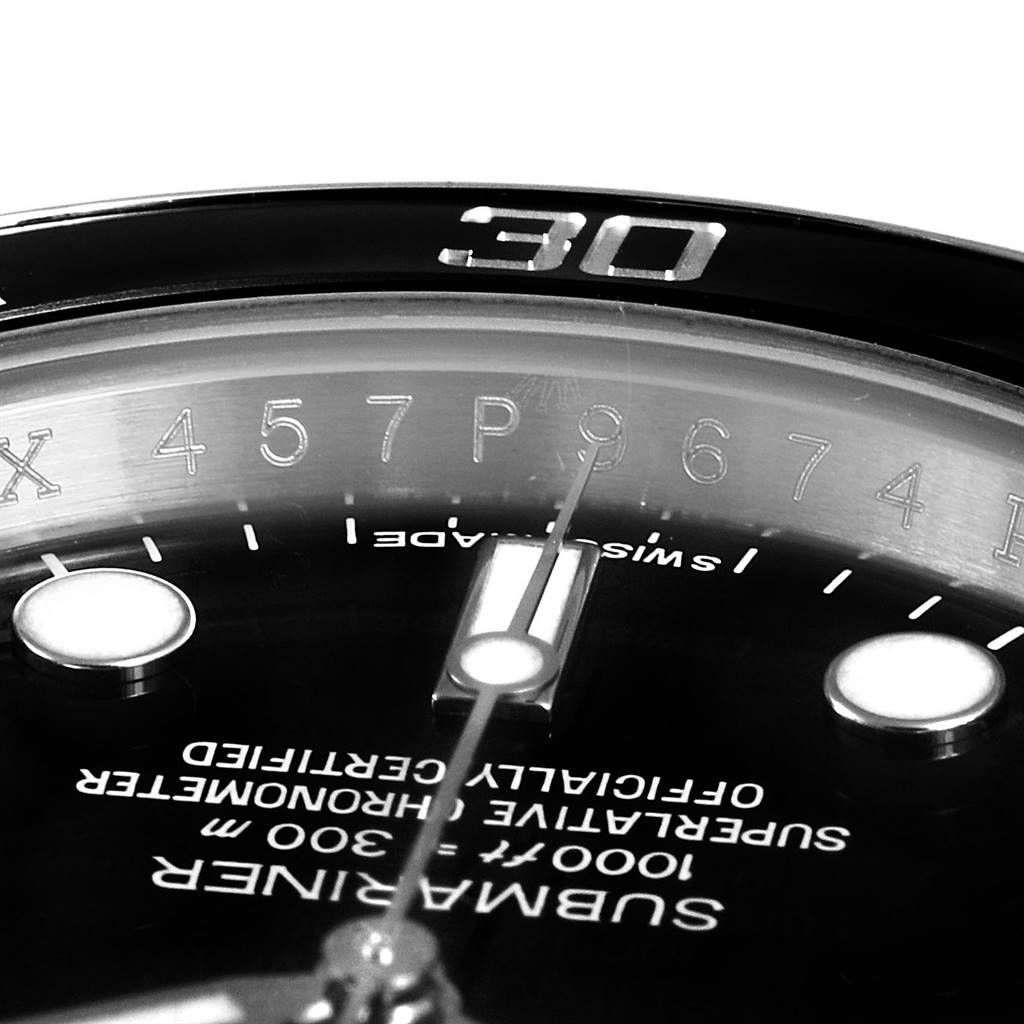 The image shows a close-up of the dial and bezel of a Rolex Submariner 116610 Men
s Stainless Steel Black Dial 116610 Men
s Stainless Steel Black Dial watch, highlighting the details and text.
