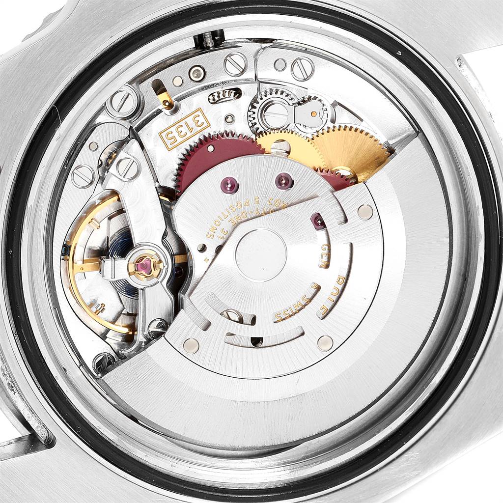 This image shows a close-up view of the movement mechanism inside a Rolex Submariner 116610 Men
s Stainless Steel Black Dial 116610 Men
s Stainless Steel Black Dial watch.