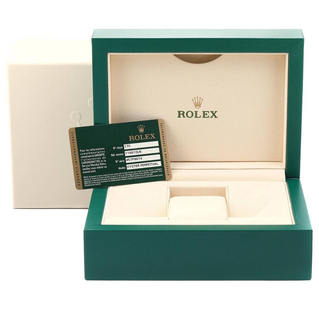 The image shows a Rolex Submariner 116610 Men
s Stainless Steel Black Dial 116610 Men
s Stainless Steel Black Dial watch box, partially opened, with a warranty card displayed on its edge.