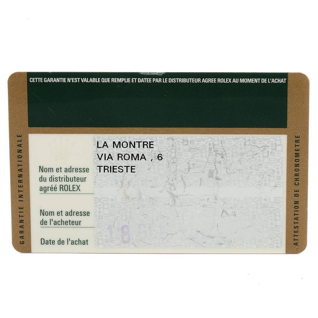 The image shows a warranty card for a Rolex Submariner 116610 Men
s Stainless Steel Black Dial 116610 Men
s Stainless Steel Black Dial, featuring the distributor
s address and purchase details.