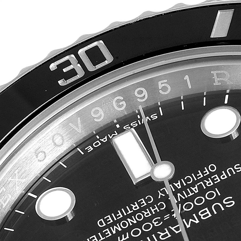 This image shows a close-up of the dial and bezel of a Rolex Submariner 116610 Men
s Stainless Steel Black Dial 116610 Men
s Stainless Steel Black Dial watch, focusing on the minute markers and text.