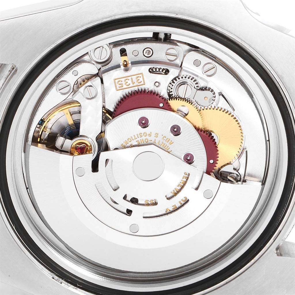 The image shows a close-up view of the movement mechanism inside a Rolex Submariner 116610 Men
s Stainless Steel Black Dial 116610 Men
s Stainless Steel Black Dial watch.