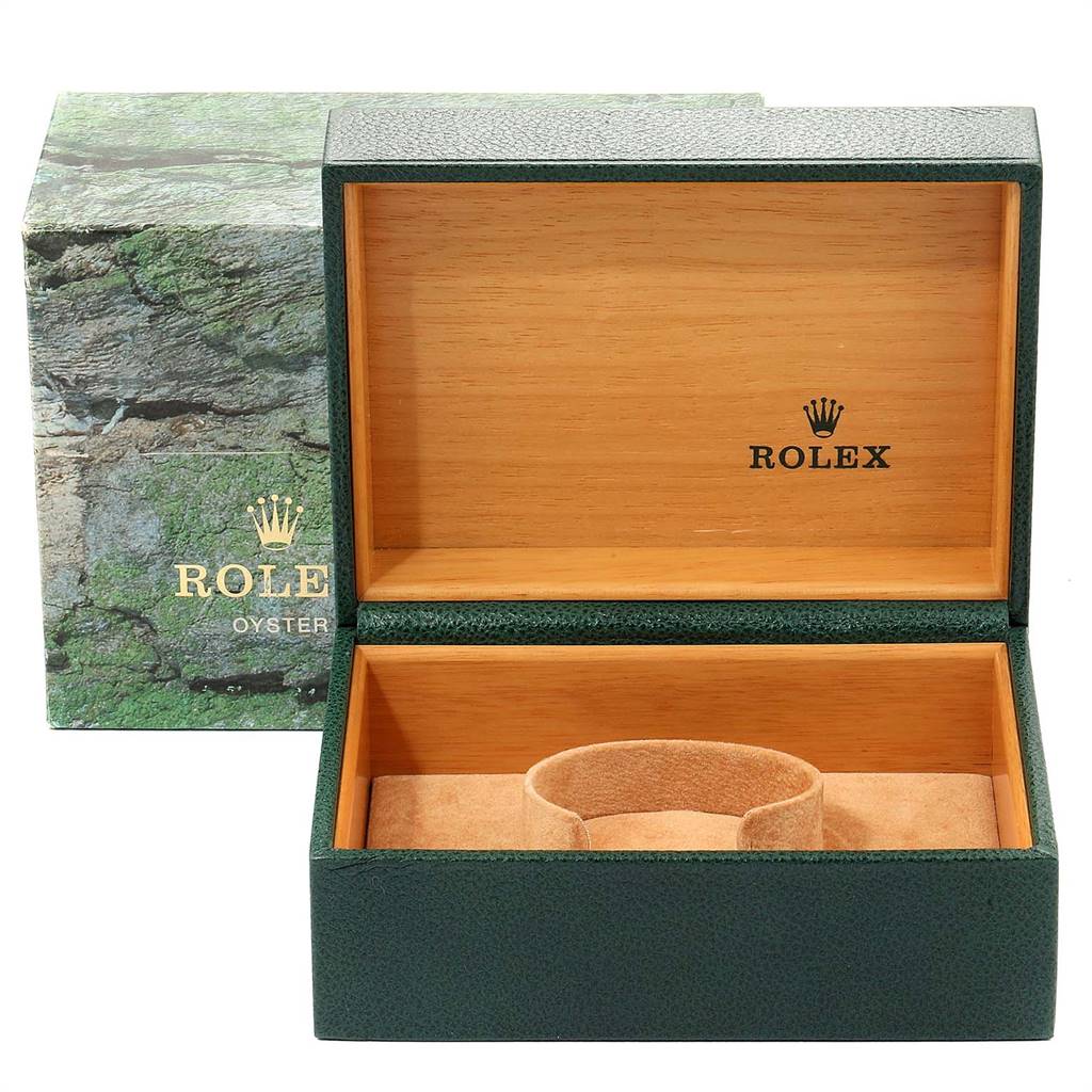 The image shows an empty Rolex Submariner 16613 Men
s Steel and Gold (two tone) Blue Dial 16613 Men
s Steel and Gold (two tone) Blue Dial box and cushion from the front angle.