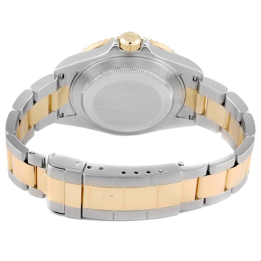 This image shows the back view of a Rolex Submariner 16613 Men
s Steel and Gold (two tone) Blue Dial 16613 Men
s Steel and Gold (two tone) Blue Dial watch, highlighting the bracelet and the case back.