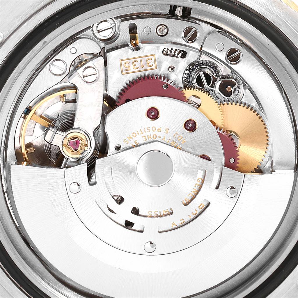 This image shows the internal mechanical movement of a Rolex Submariner 16613 Men's Steel and Gold (two tone) Black Dial 16613 Men's Steel and Gold (two tone) Black Dial watch from a top-down angle.