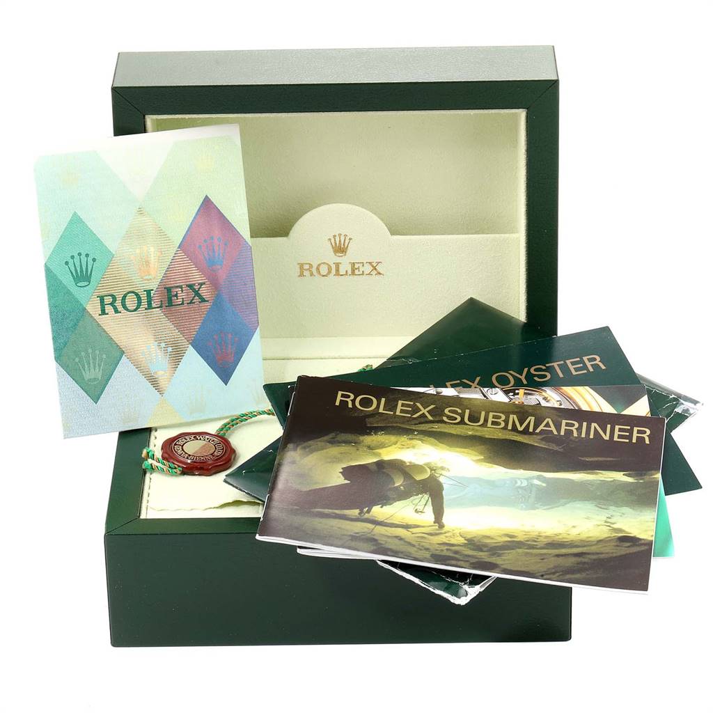 The image shows a Rolex Submariner 16613 Men's Steel and Gold (two tone) Black Dial 16613 Men's Steel and Gold (two tone) Black Dial box, warranty booklet, manual, and tags from a top-front angle.