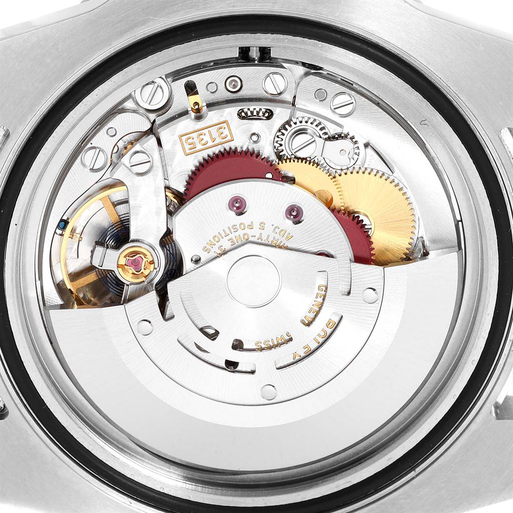 This image shows the intricate internal movement mechanism of a Rolex Submariner 116613 Men
s Steel and Gold (two tone) Blue Dial 116613 Men
s Steel and Gold (two tone) Blue Dial watch, viewed from the back.