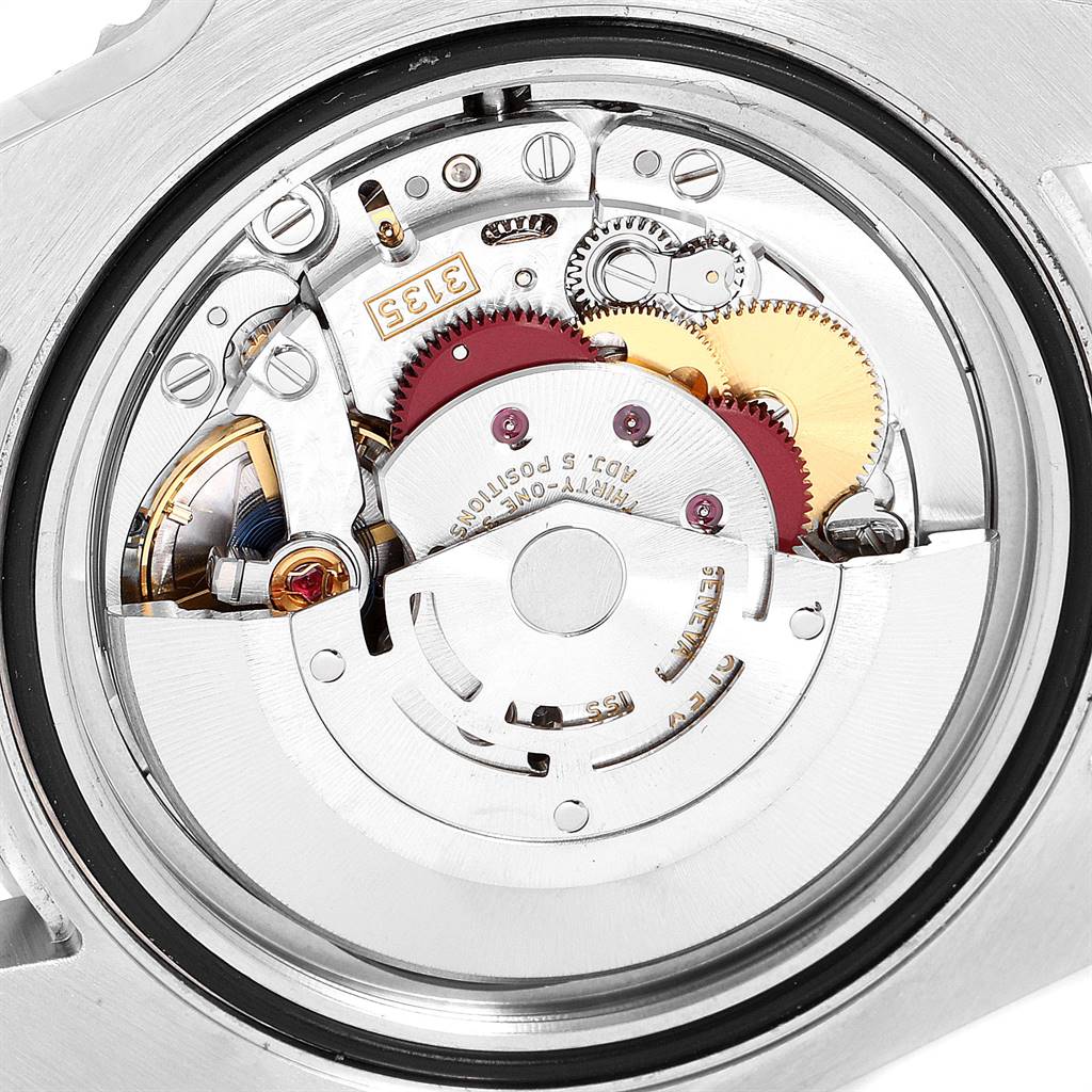 This image shows the intricate internal mechanism and movement parts of a Rolex Submariner 116610 Men
s Stainless Steel Black Dial 116610 Men
s Stainless Steel Black Dial watch from a close-up angle.