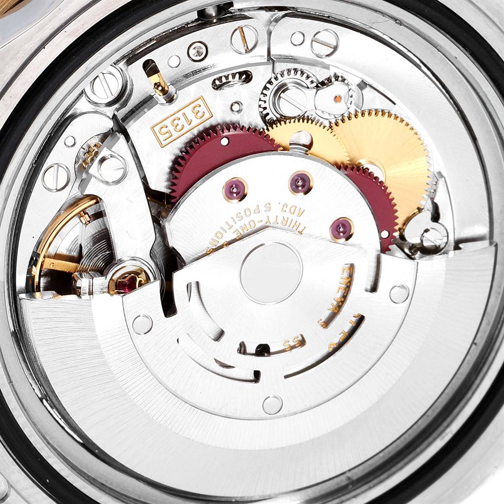 This is a close-up view of the movement and inner mechanics of the Rolex Submariner 16613 Men
s Steel and Gold (two tone) Blue Dial 16613 Men
s Steel and Gold (two tone) Blue Dial watch.