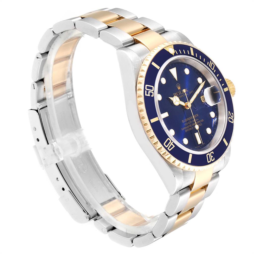 The Rolex Submariner 16613 Men
s Steel and Gold (two tone) Blue Dial 16613 Men
s Steel and Gold (two tone) Blue Dial watch is shown at a three-quarter angle, highlighting the bracelet, bezel, and dial.