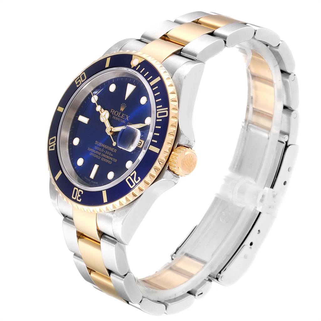 This image shows a Rolex Submariner 16613 Men
s Steel and Gold (two tone) Blue Dial 16613 Men
s Steel and Gold (two tone) Blue Dial watch at a tilted front angle, highlighting the blue dial, two-tone bracelet, and bezel.