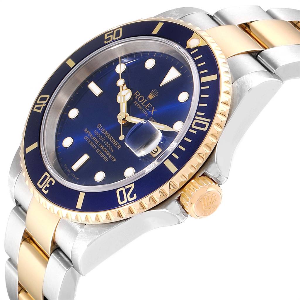 The image shows a close-up side view of the Rolex Submariner 16613 Men
s Steel and Gold (two tone) Blue Dial 16613 Men
s Steel and Gold (two tone) Blue Dial watch, highlighting its blue dial, gold bezel, and two-tone bracelet.