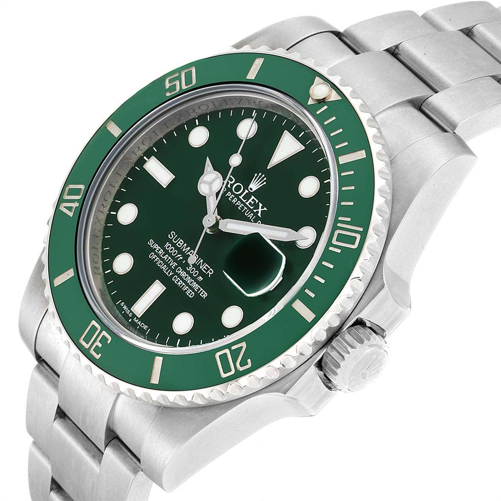 The image shows a Rolex Submariner 116610LV Men
s Stainless Steel Green Dial 116610LV Men
s Stainless Steel Green Dial watch, focusing on its green bezel, dial, and part of its stainless steel bracelet.