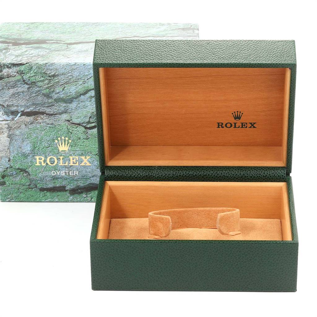 The image displays an open green Rolex Submariner 16610 Men's Stainless Steel Black Dial 16610 Men's Stainless Steel Black Dial watch box with wood-finished interior.
